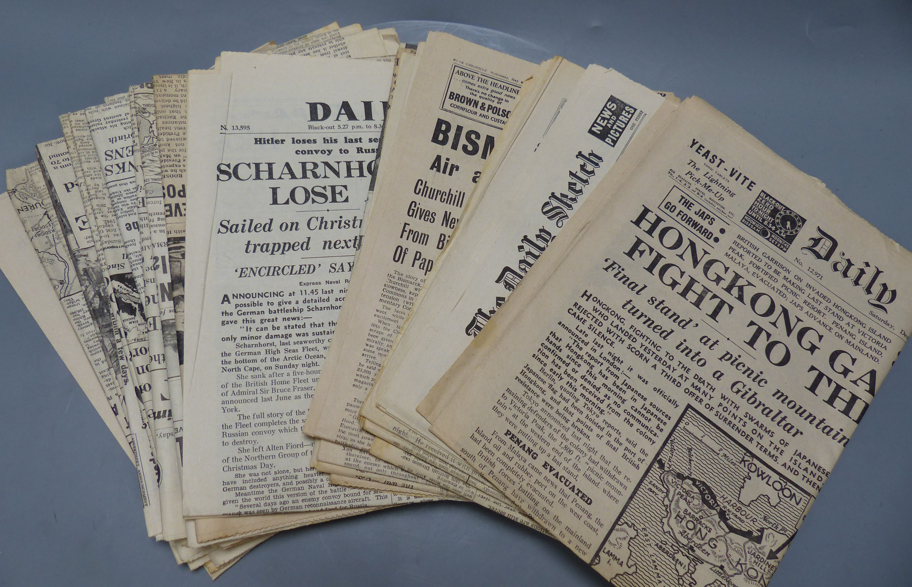 32 various WWII newspapers